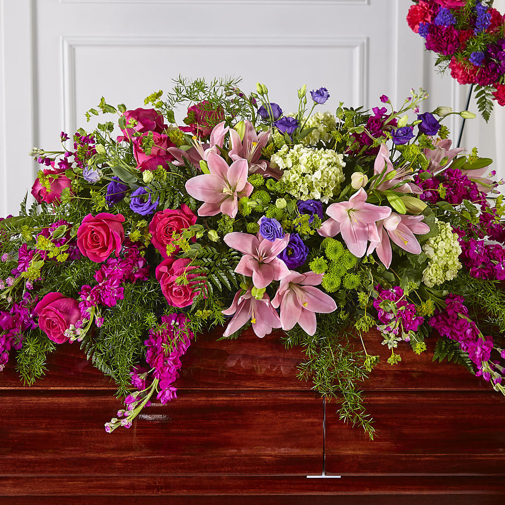 Radiant Tribute Casket Spray – Perkins Floral, Greenville MS